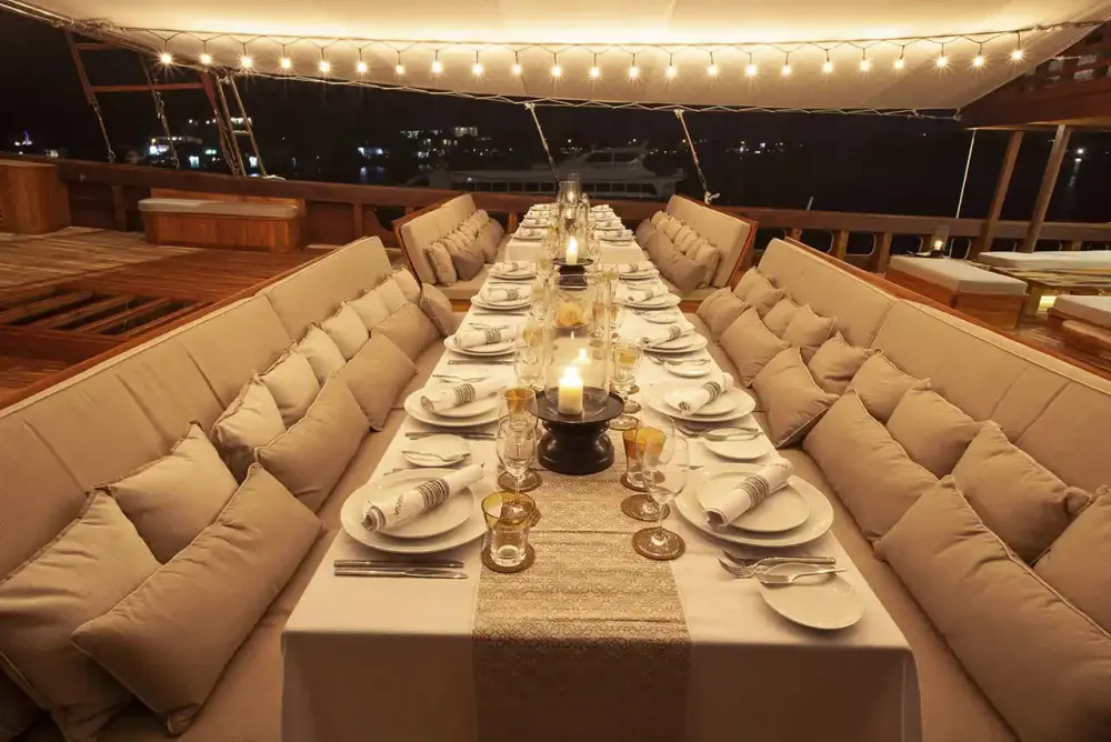 Candle-lit dining saloon on board
