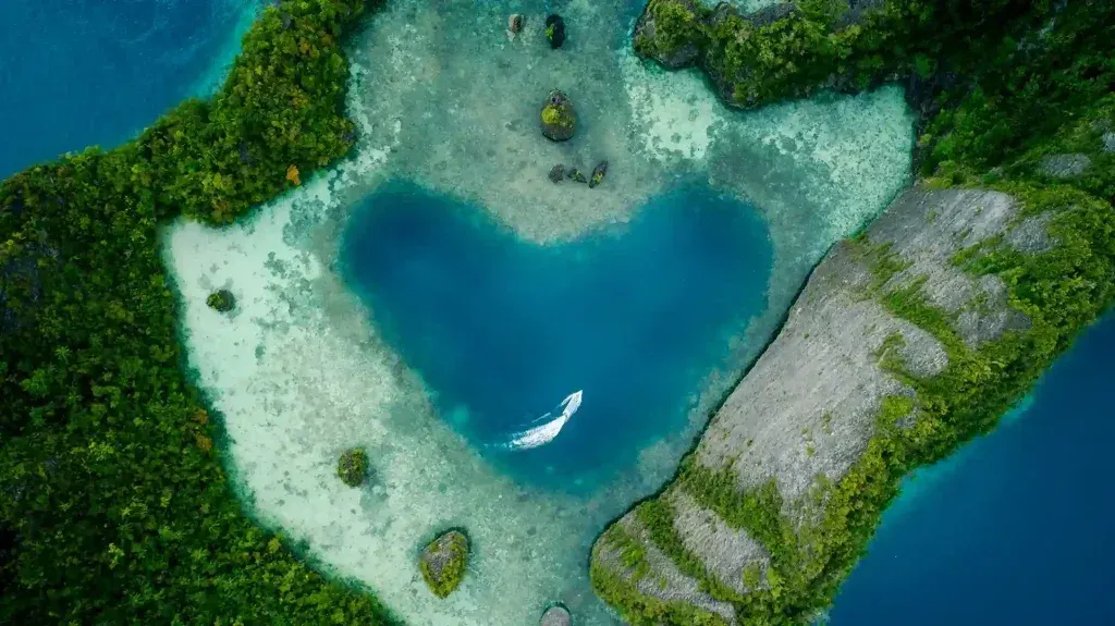 Heart-shaped lagoon in Misool from above